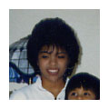 Me at 13 years old with big '80s style hair.